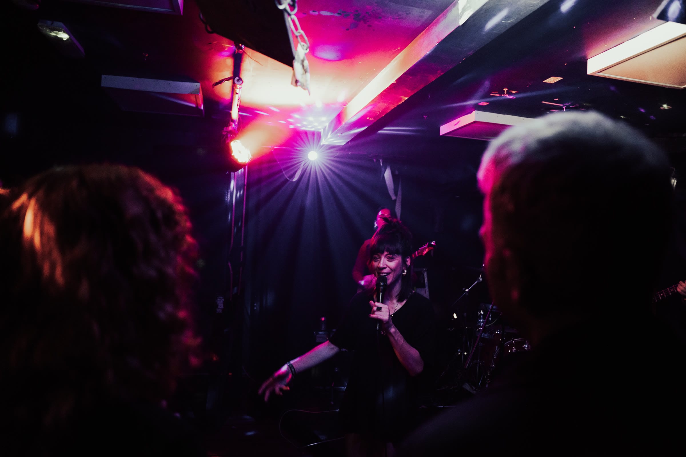 An artist performing live at an intimate Beyond The Music show
